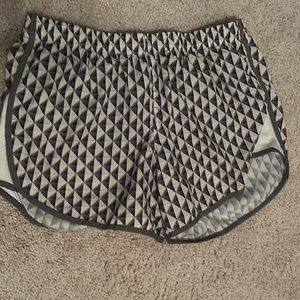 M grey and white running shorts.